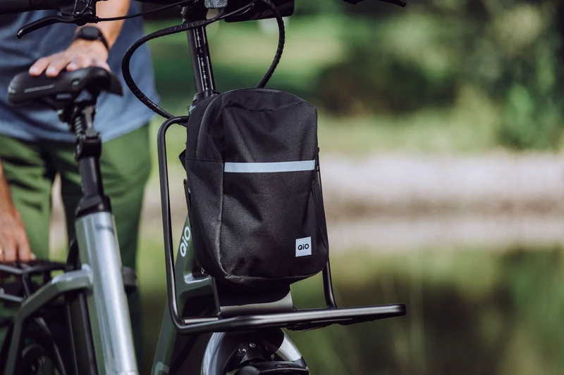 QIO Schultertasche Tom